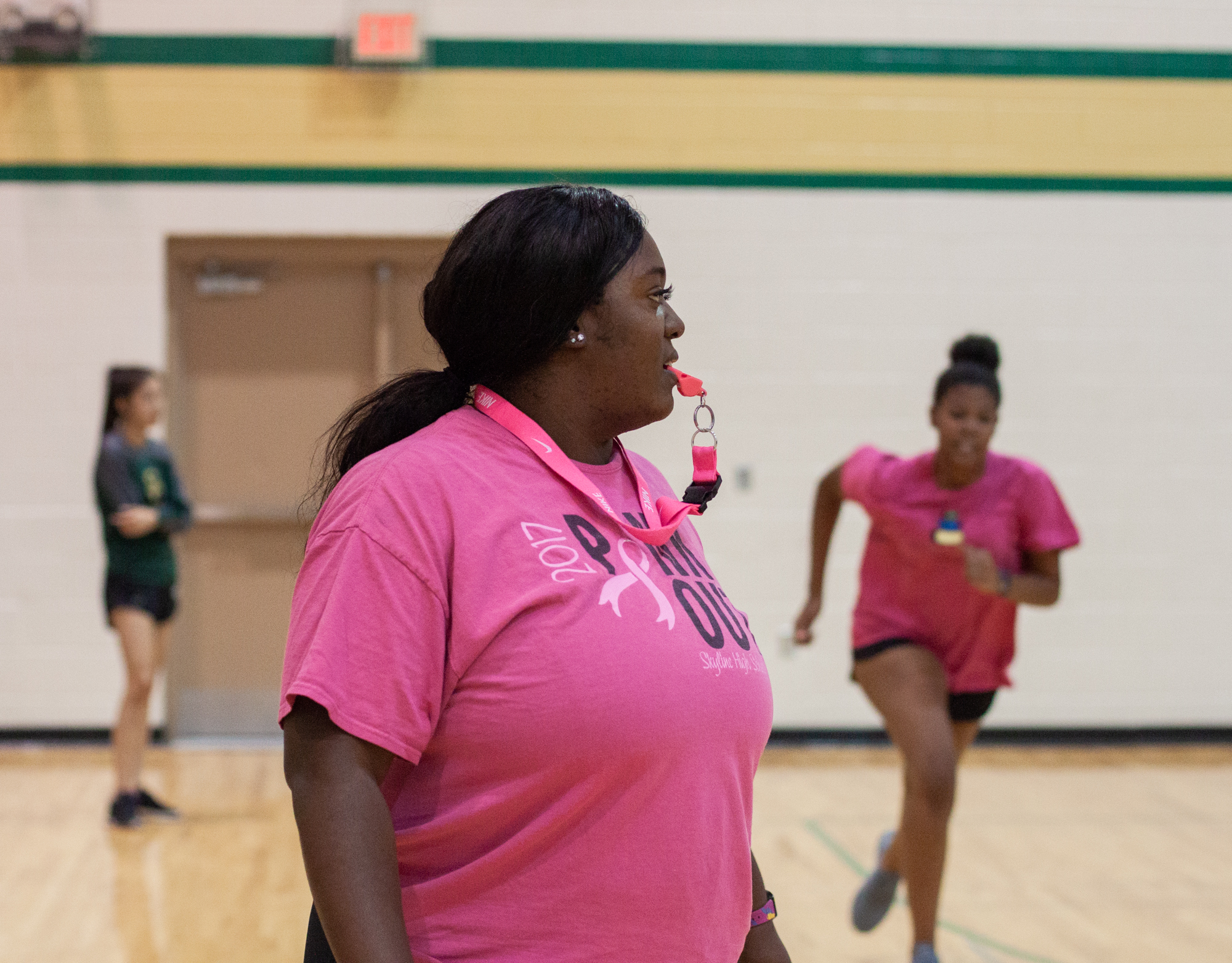  Chiniqua Bright looks on as her students participate in a relay race on Oct. 3, 2018. She said the lack of racial and gender diversity in gym teachers was one reason she pursued a career in the field. “I wondered, ‘where are all the girls?’” she rec