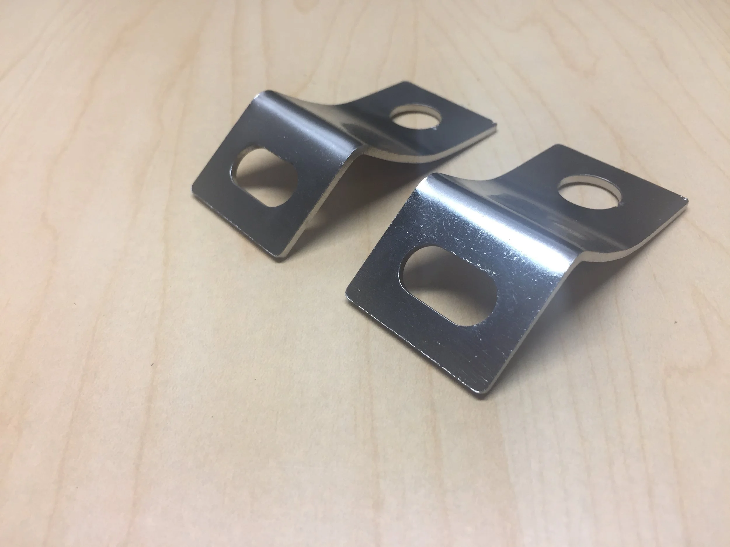 69-70 bumper-valance support bracket set.JPG