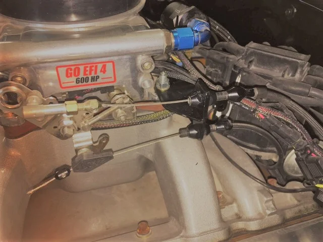 Fitech EFI Throttle cable bracket on car.JPG