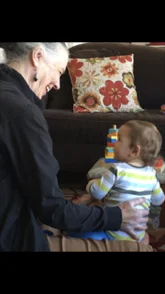 Evelyn Miller-Freebury working with a child
