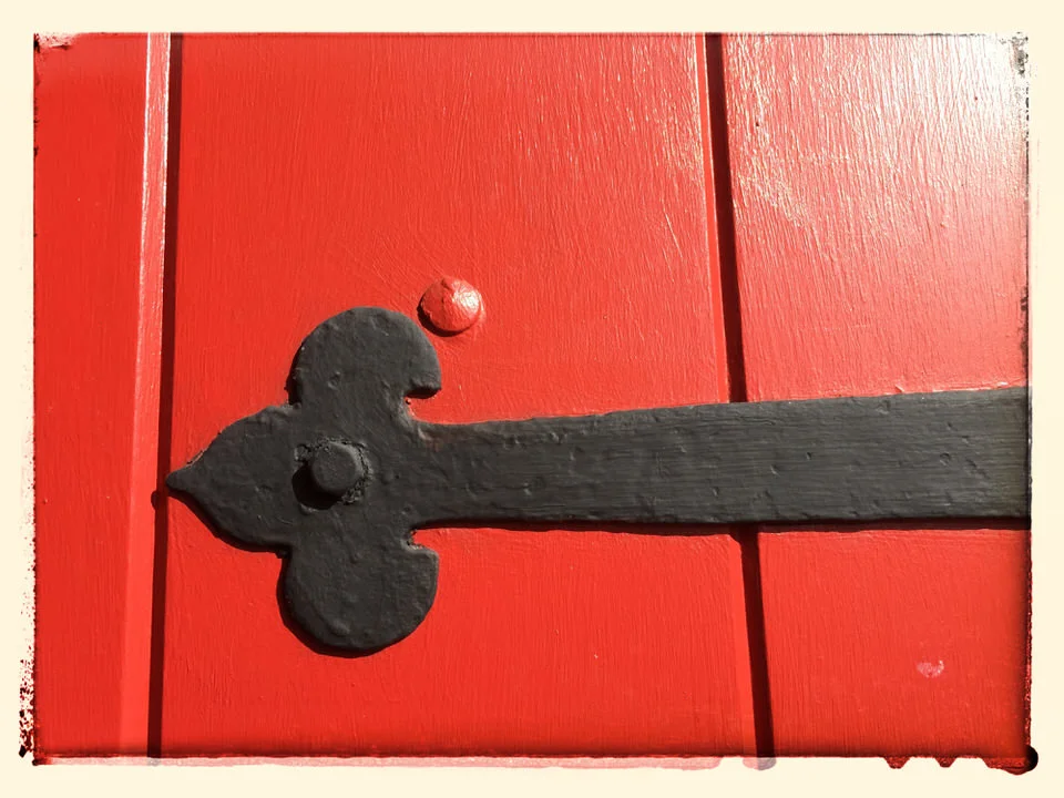 Red strap hinge