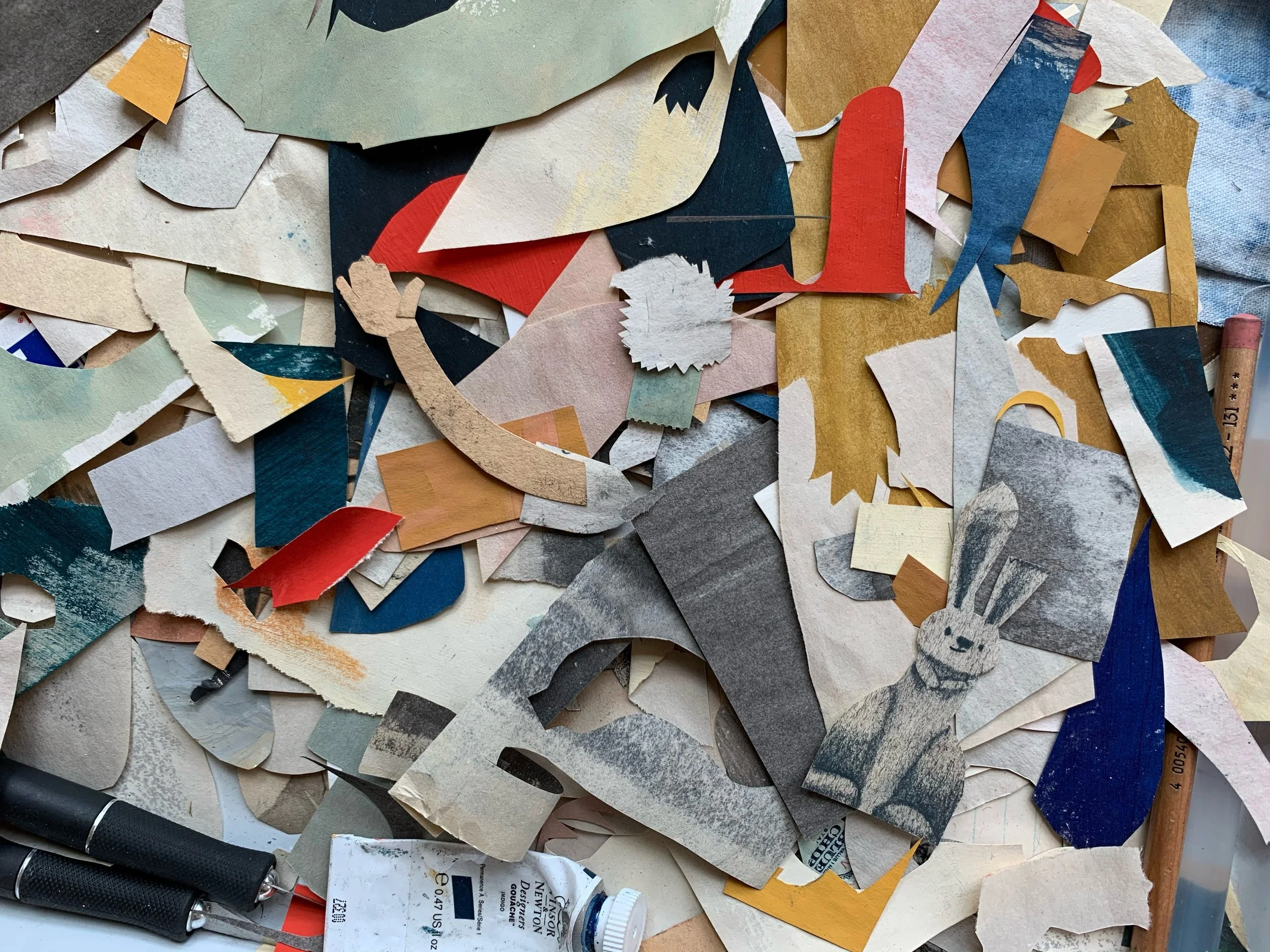 Many, many pieces of painted paper that are used in collage art of To Make!