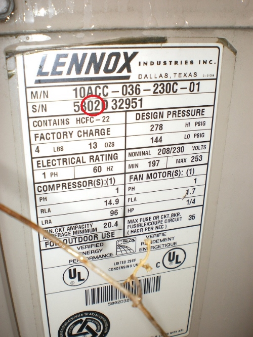 The data plate in this A/C unit shows that it was from 2002 