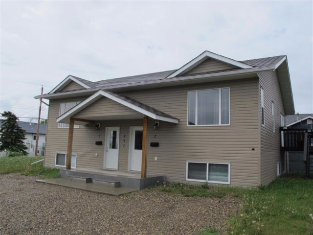 An actual as-built duplex property recently listed in British Columbia