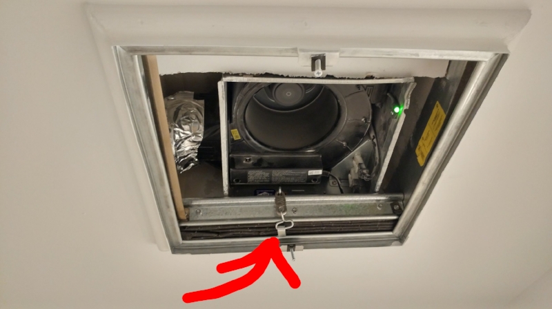This may look like a boring old bathroom fan, but this one has a cool little ring that snaps open if there's a fire, releasing a fire rated damper that closes the opening shut - not allowing fire to pass through