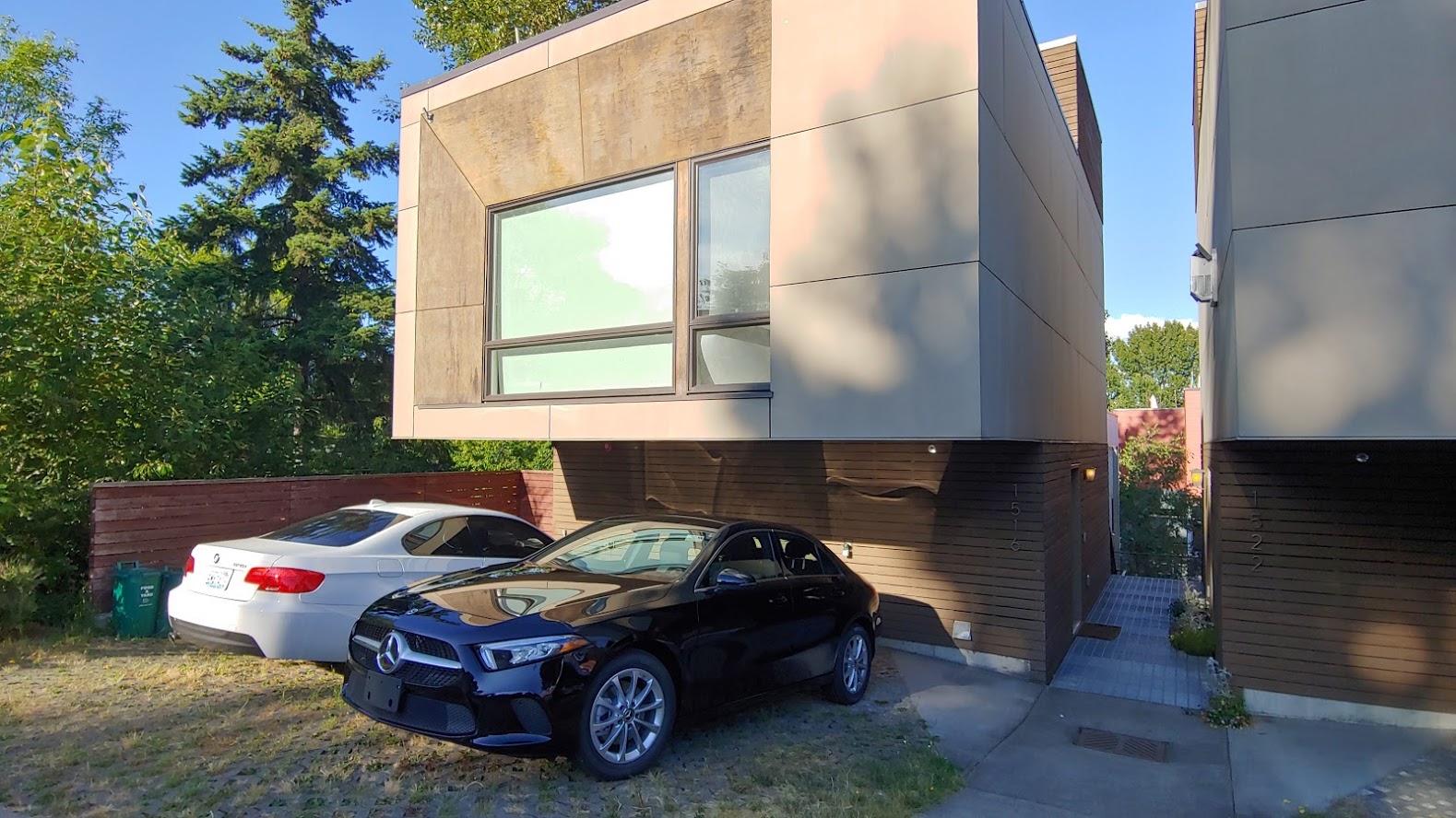 I stayed in this Airbnb, which is an infill development of 4 new houses in a single lot (2 in front and 2 in the back). 1 parking space required in each house at the front.