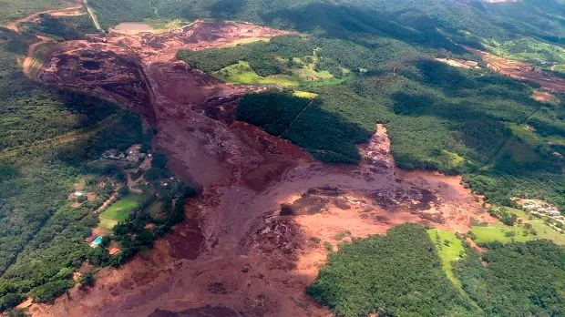 Handout picture released by the Minas Gerais Fire Department showing an aerial view taken after the collapse of a dam, which belonged to Brazil’s giant mining company Vale, near the town of Brumadinho in southeastern Brazil, on January 25, 2019. (Photo by HO / Minas Gerais Fire Department / AFP) /
