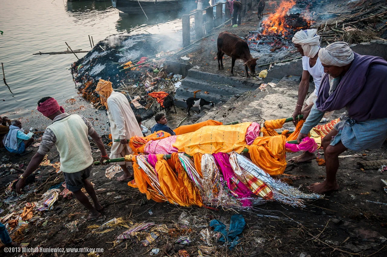 You'll see bodies being transported throughout the city. It's a scene I will never forget... A body held over the heads of family members, mourning and chanting. All the bodies are kept in a few large buildings by the waters edge until it's time for the cremation to occur. Hindus believe that this is a "rite of passage". It prepares their life for the afterworld. *Picture taken from google images because you're not suppose to take pictures while observing the cremations. 
