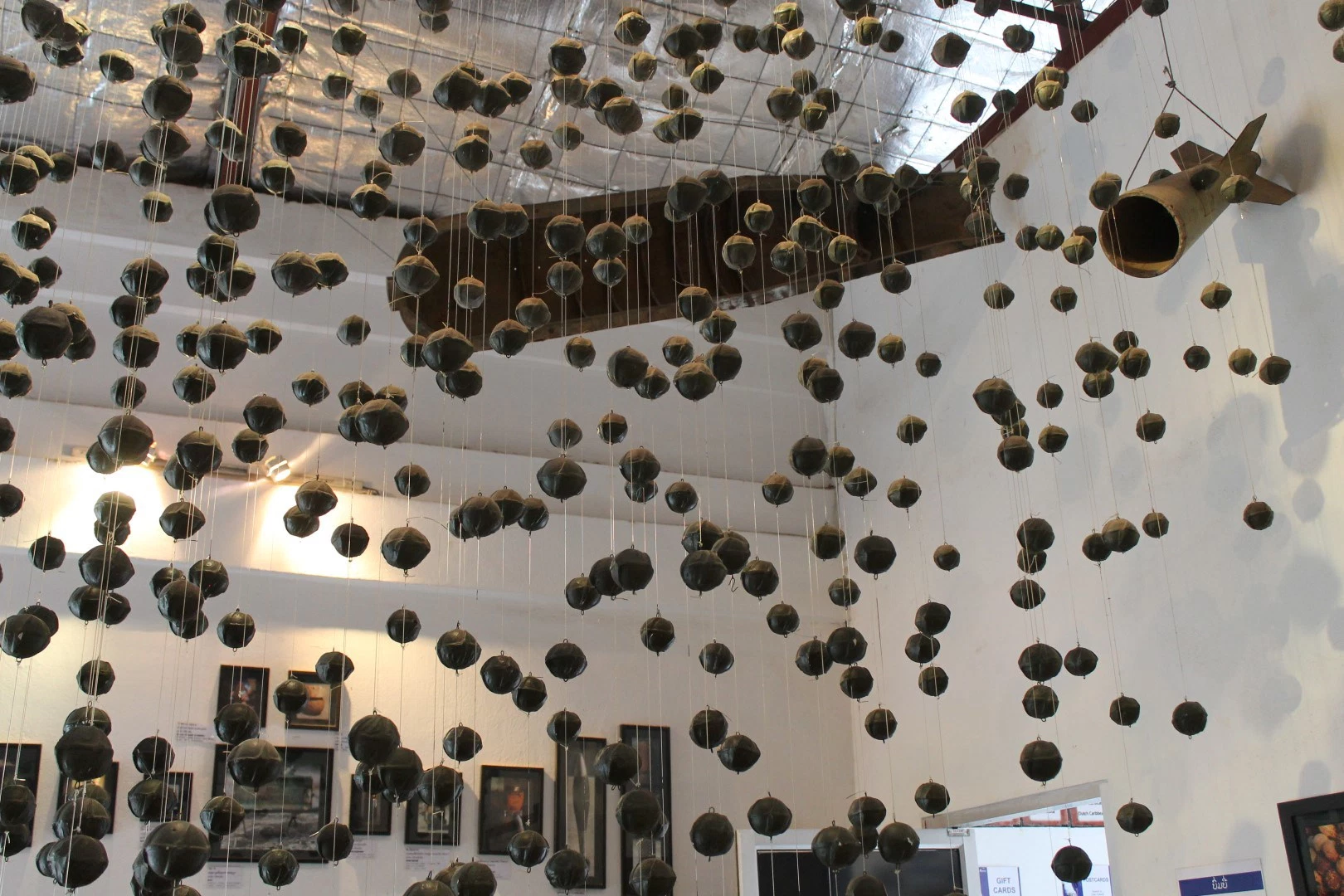 Mural made from cluster bombs. These terrible bombs are still exploding today. More than 270 million cluster munitions (or ‘bombies’, as they are known locally) were used; up to 80 million failed to detonate, remaining live and in the ground after the end of the war.