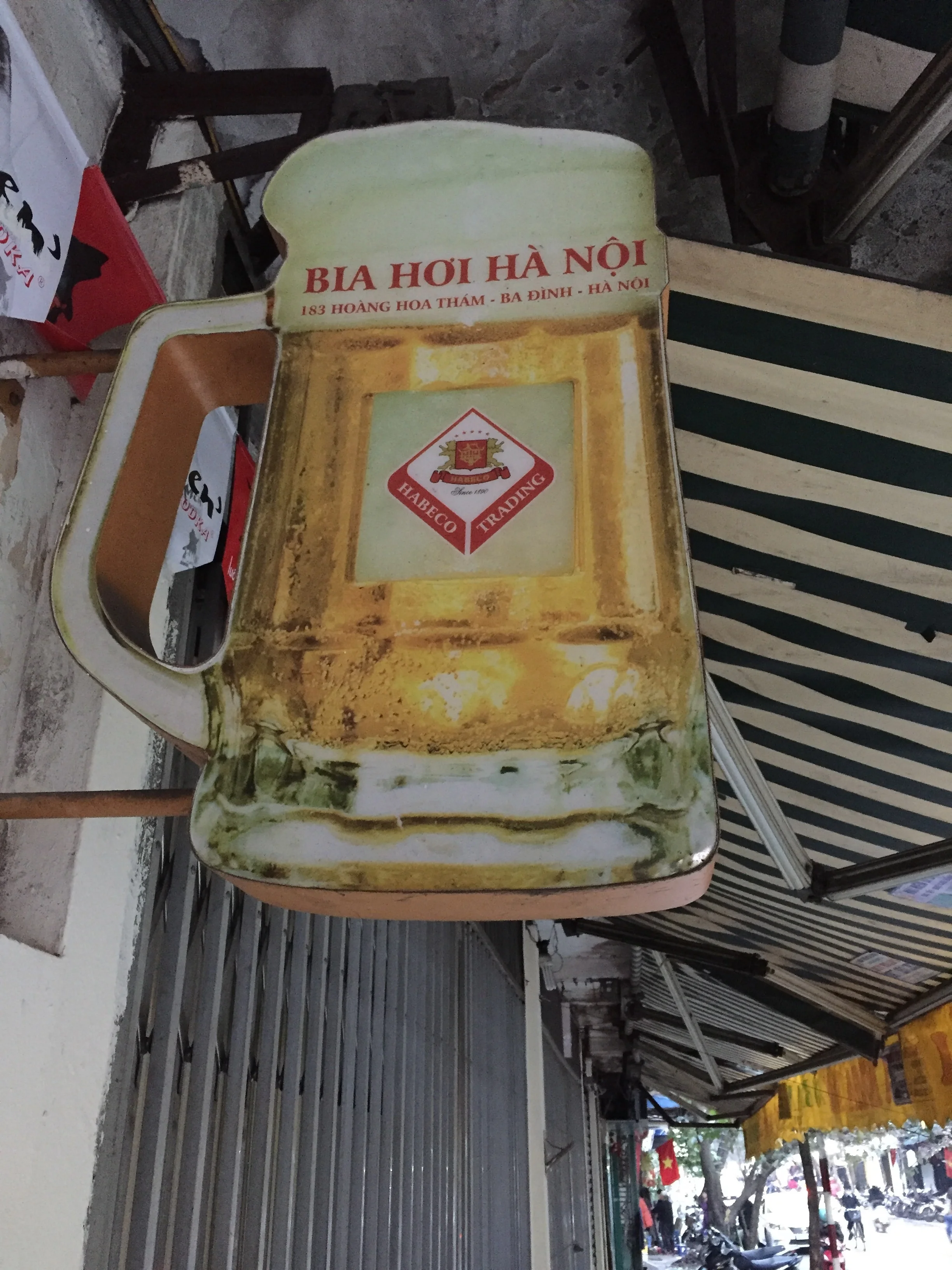 Bia Hoi. It's fresh, it's local, and probably the cheapest beer in the world. I think one 12oz glass cost around 13,00 dong (60 cents USD). 