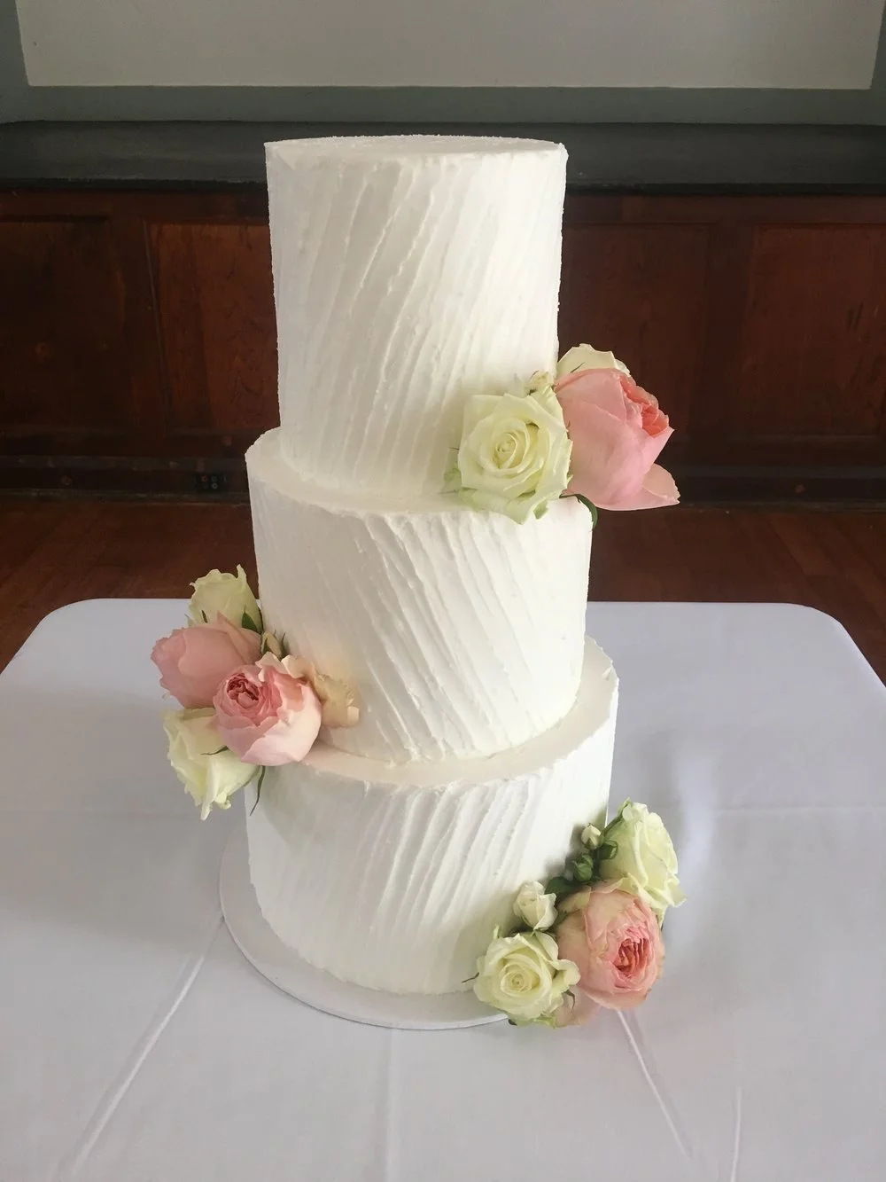3 Tier Diagonal Lined Buttercream Cake with Pink & White Flowers