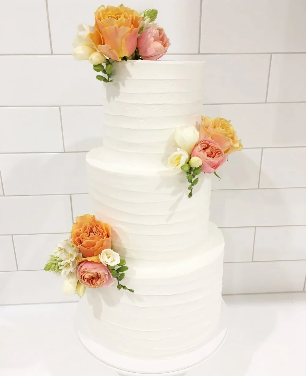 3 Tier Horizontal Lined Buttercream with Fresh Flowers