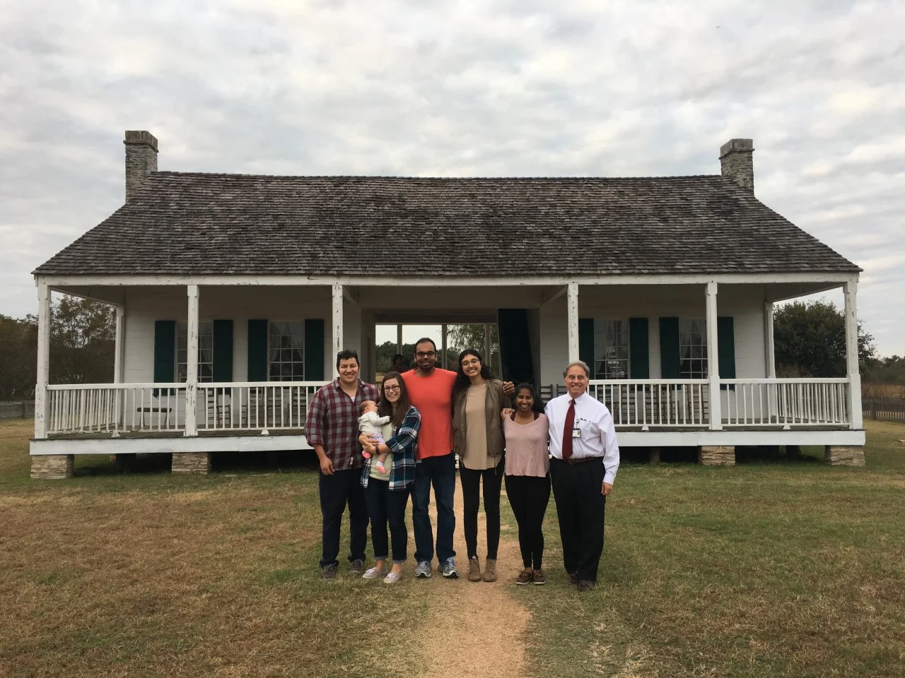 M2s (from left) Johnny Cummock, Rachael Counts, Kieran Boochoon, Puja Panwar, and Neha Rao along with Mark Sicilio, MD, and a future medical student (Johnny’s baby) on a Humanities in Medicine elective field trip to the home of Anson Jones, MD, last President of the Republic of Texas. Photo provided by Mark Sicilio, MD.