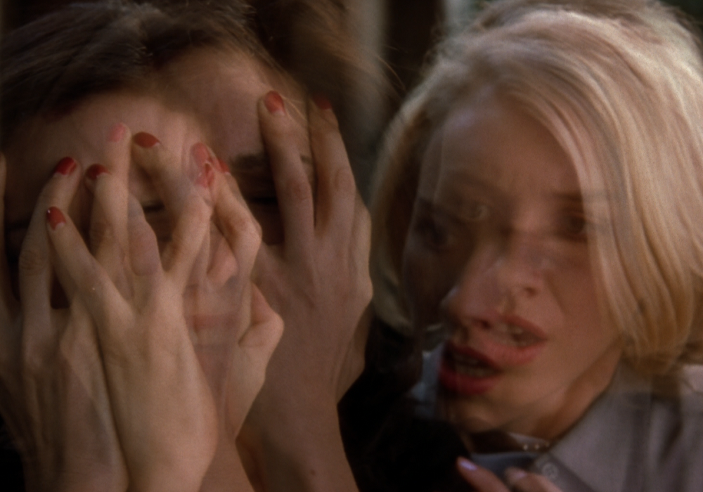 Mulholland Drive ’s multiples; the superimposition is visual shorthand for a ruptured psyche/fragmented self.