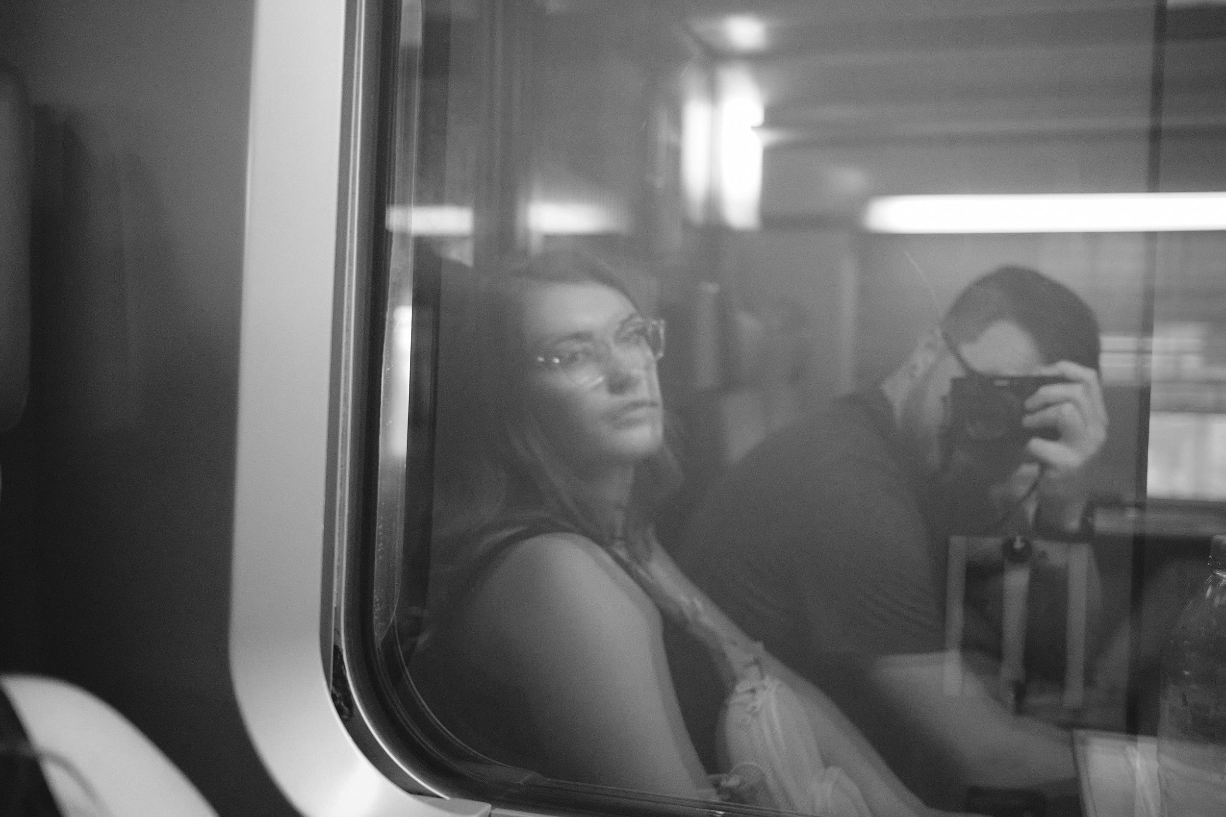 In Reflection: Connor and Krysta's Artistic Self-Portrait on a Paris Train