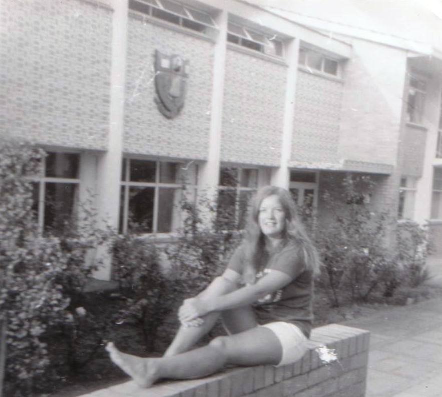 Ann McIlroy posing out the front of St Cats 1971.jpg