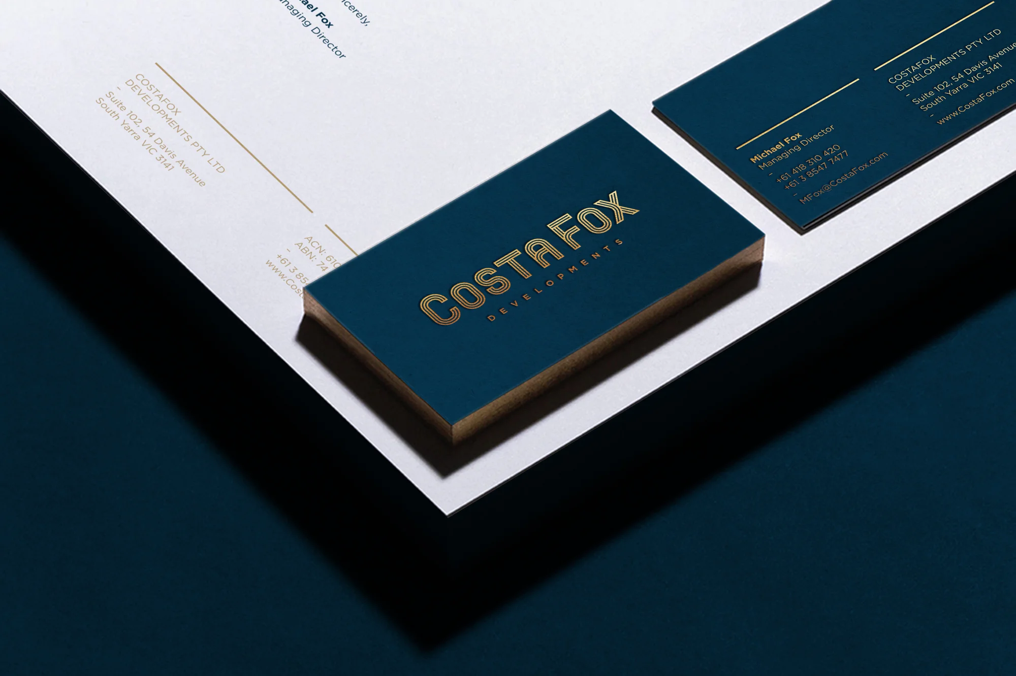 CostaFox Property Developer Branding applied business cards with gold edging and letterhead