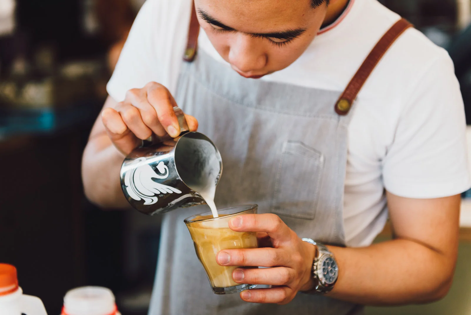 Lifestyle Property Development photoshoot cafe barista pouring coffee