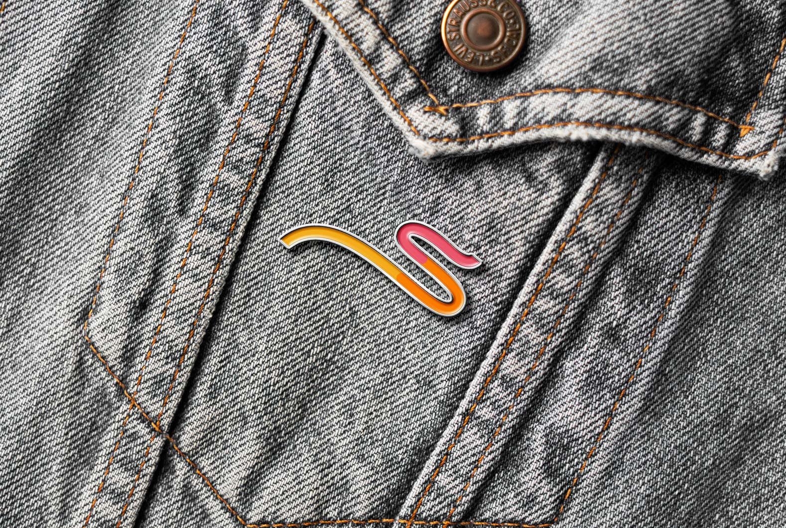 Sparkways custom branded logo pin on jacket pocket