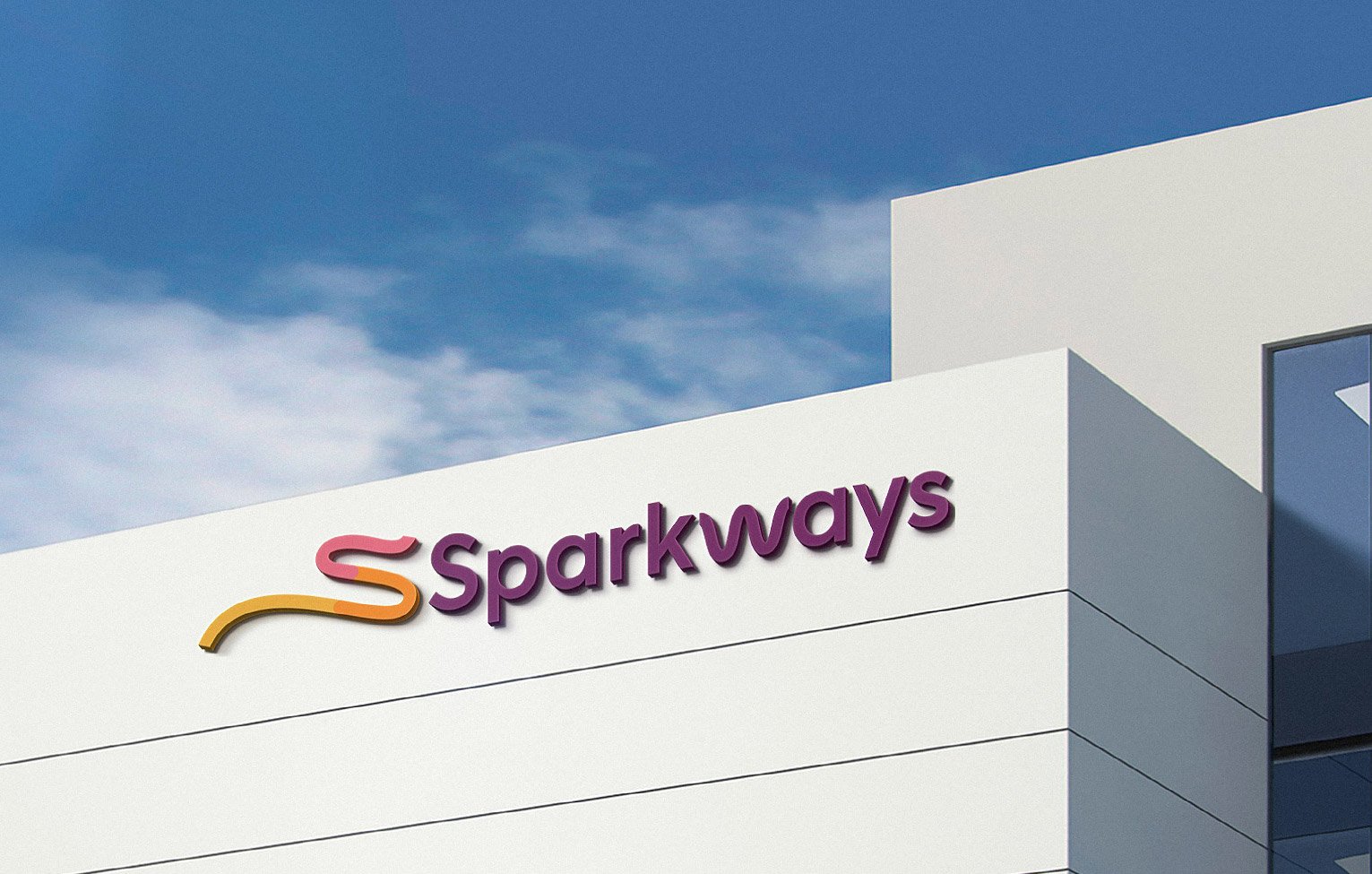Sparkways logo on building, custom signage