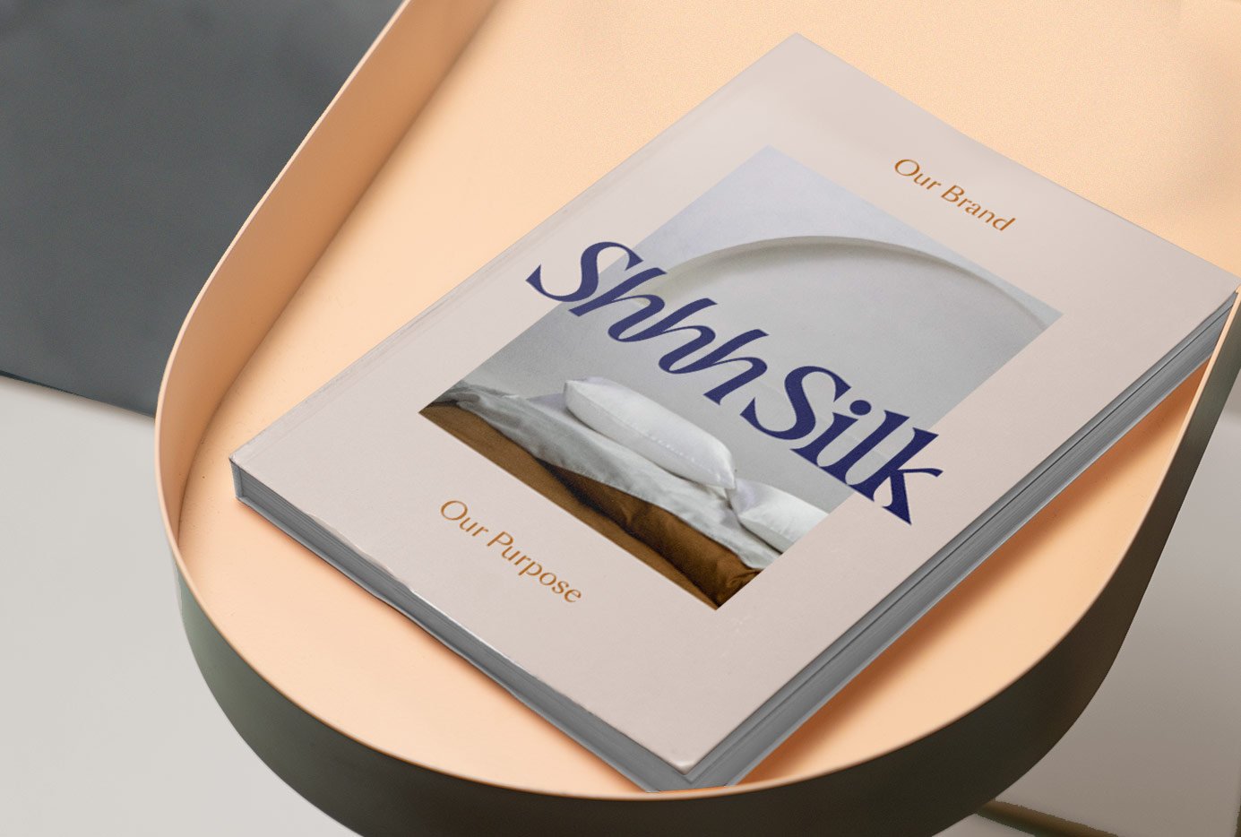 Shhh Silk Brand Book Design on Coffee Table