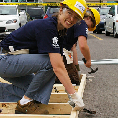MOBILIZING THE COMMUNITY Habitat for Humanity mobilizes the community to help building affordable housing and promotes homeownership for those who can least afford it. For us, it's a family affair.