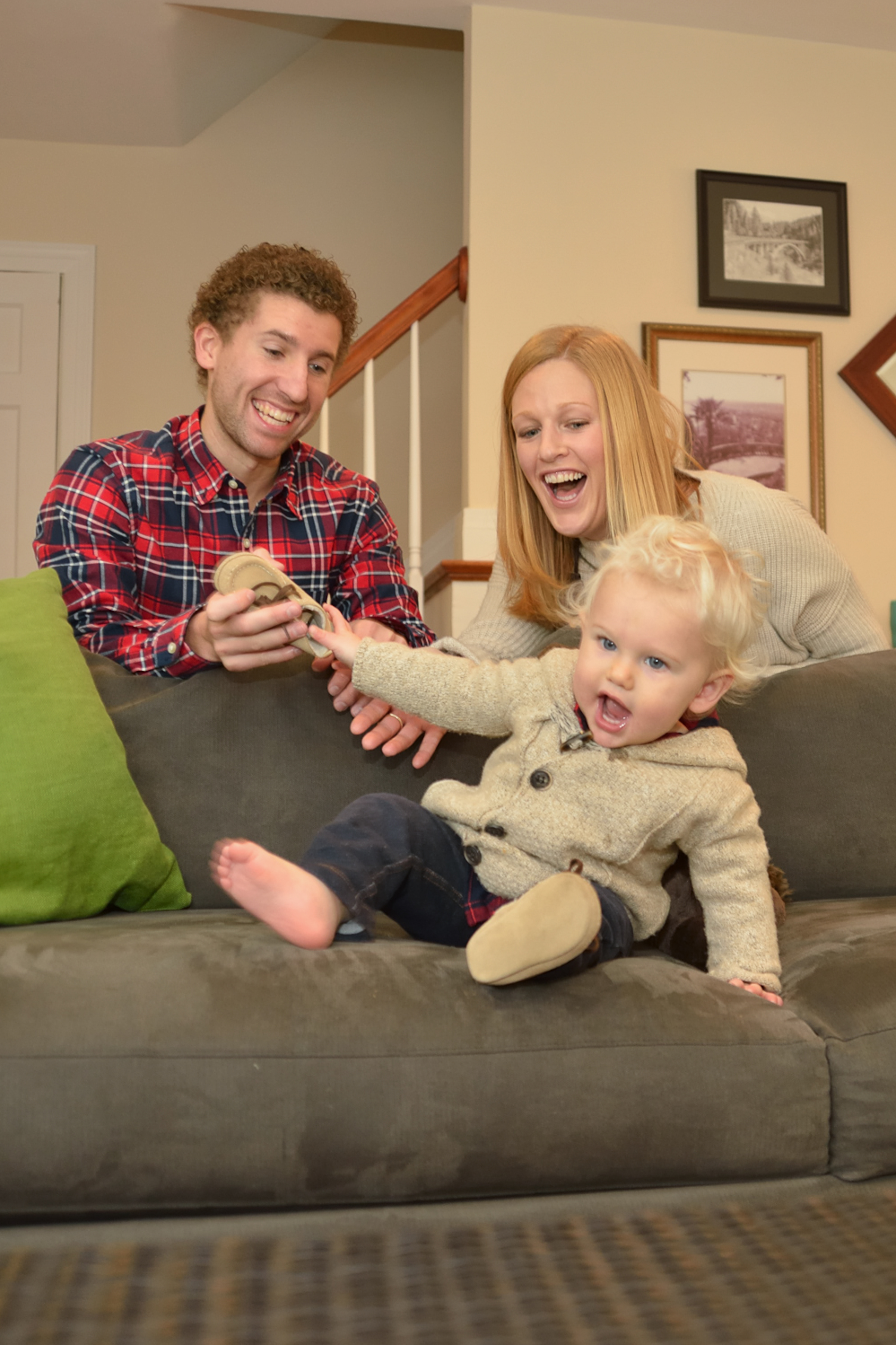 They had a super cute pose and in two seconds, he decided he didn't like his shoe. It made for a really cute reaction shot - this is more of real life things that happen. Keep these images, these faces say it all about parenting littles.