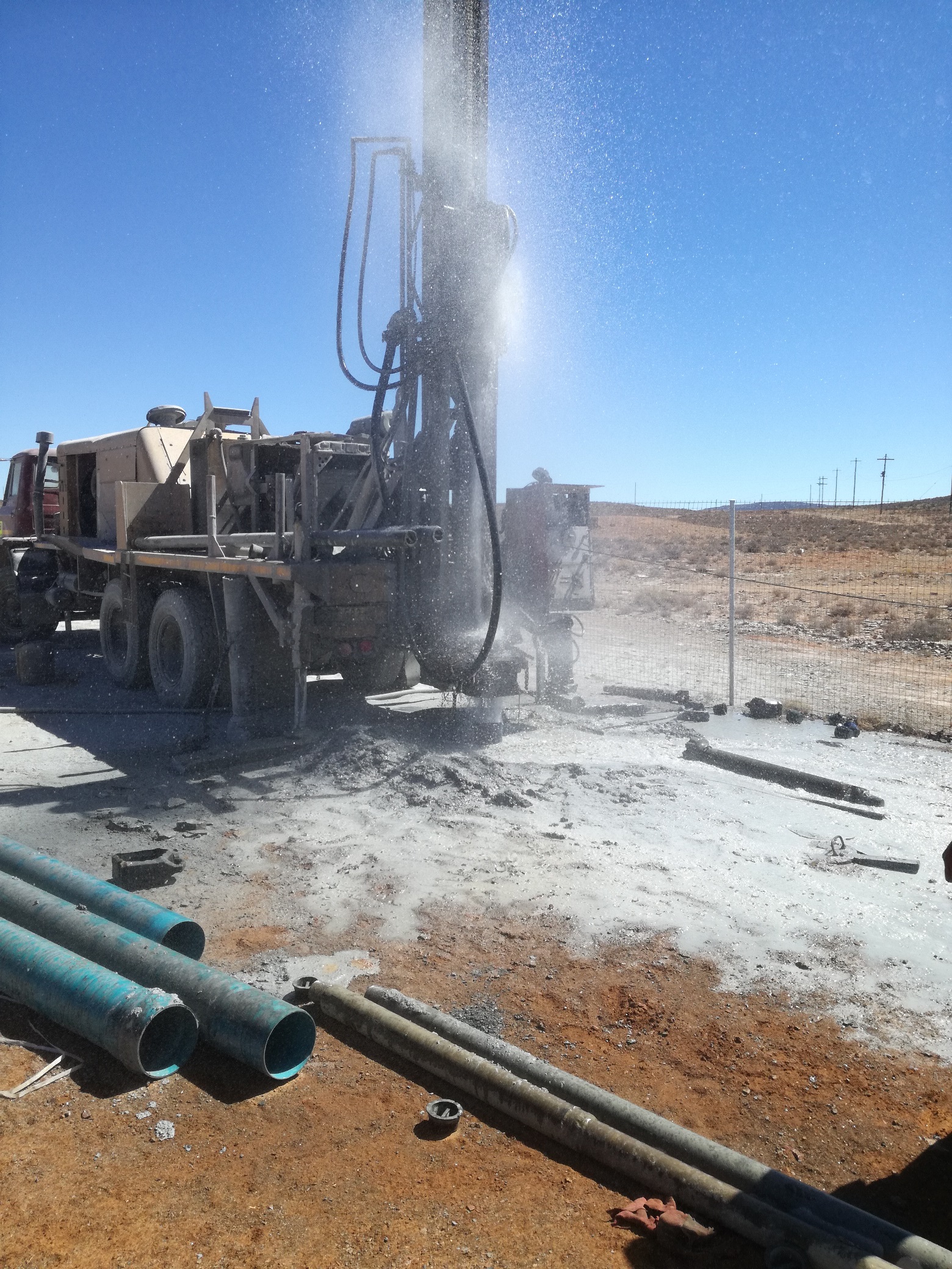 Air lifted groundwater saturates dry school yard