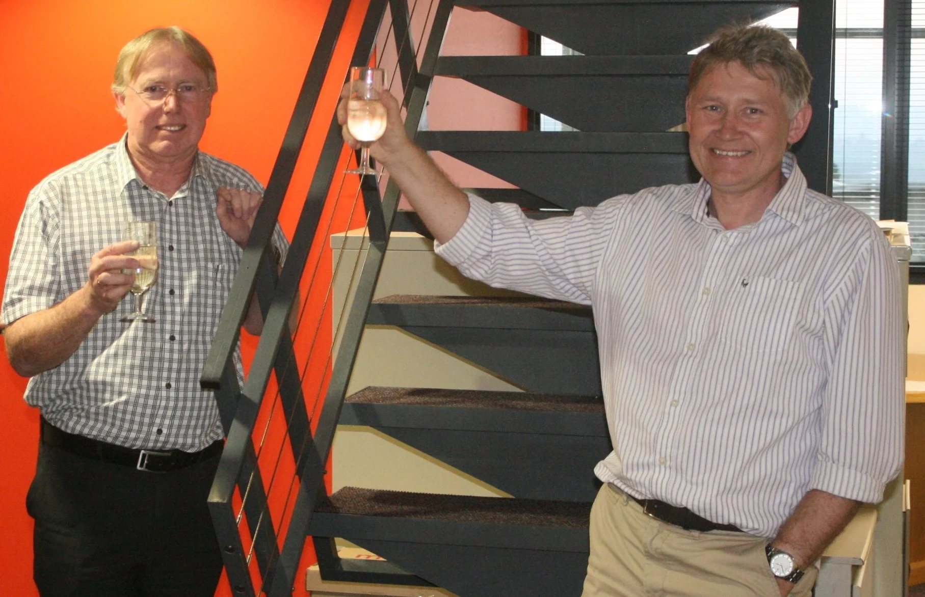 Celebrating 25 years - Rob McNeill, corporate consultant and principal geotechnical civil engineer (left) and Angus Bracken, partner and principal engineering geologist.