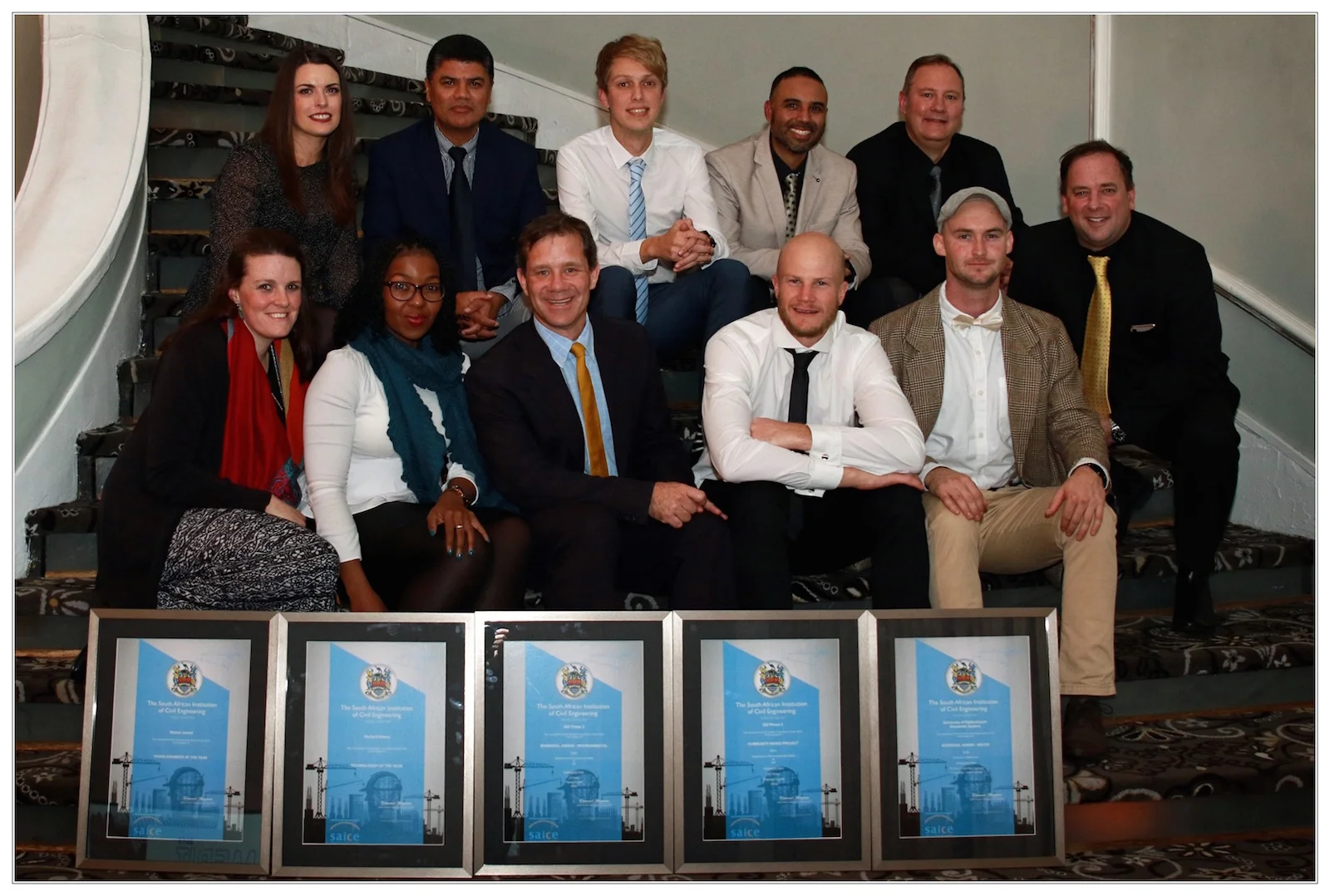 JG Afrika’s winning team …. Back row: Terri-Ann Kruger, Owen Davis , Byron Mawer, Fareed Ismail and Wimpie Krügel. Front row: Viola Milner, Zama Mdlalose, Richard Emery, Bobby Jarratt, Benjamin Biggs, Andrew Clothier.