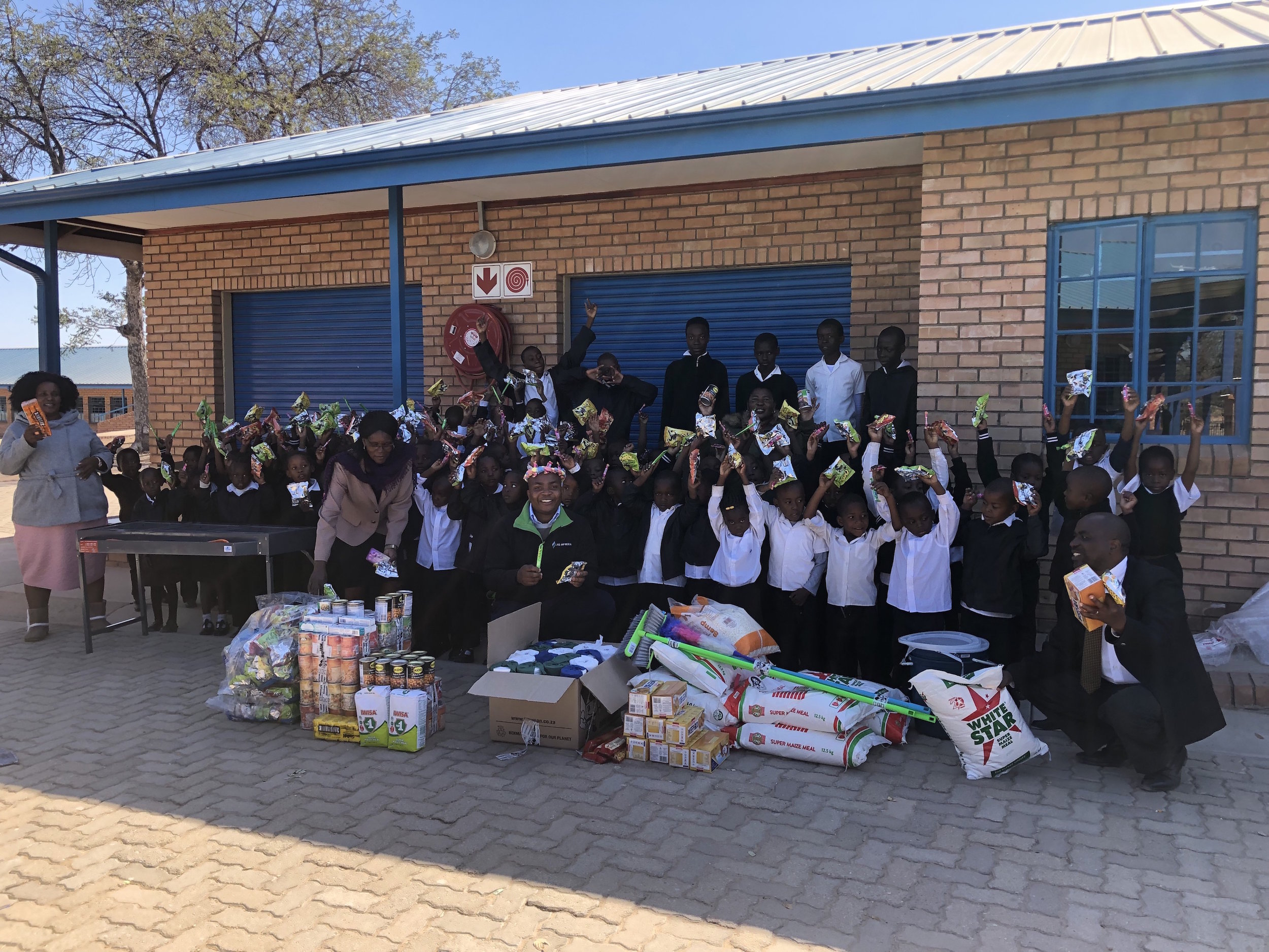 It was a joyous occasion when Pilusa arrived bearing bags of groceries collected by the firm’s Johannesburg staff on Mandela Day.