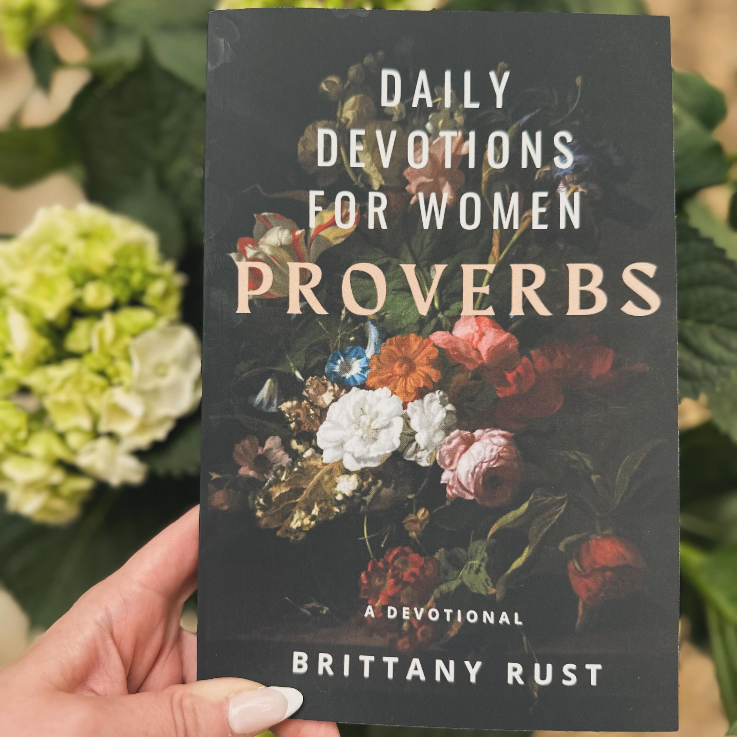 Step into a journey of wisdom and grace with &ldquo;Daily Devotions for Women: Proverbs.&rdquo; In this beautifully crafted collection of devotionals, each page beckons women to delve into the timeless wisdom found within the book of Proverbs.

Writt