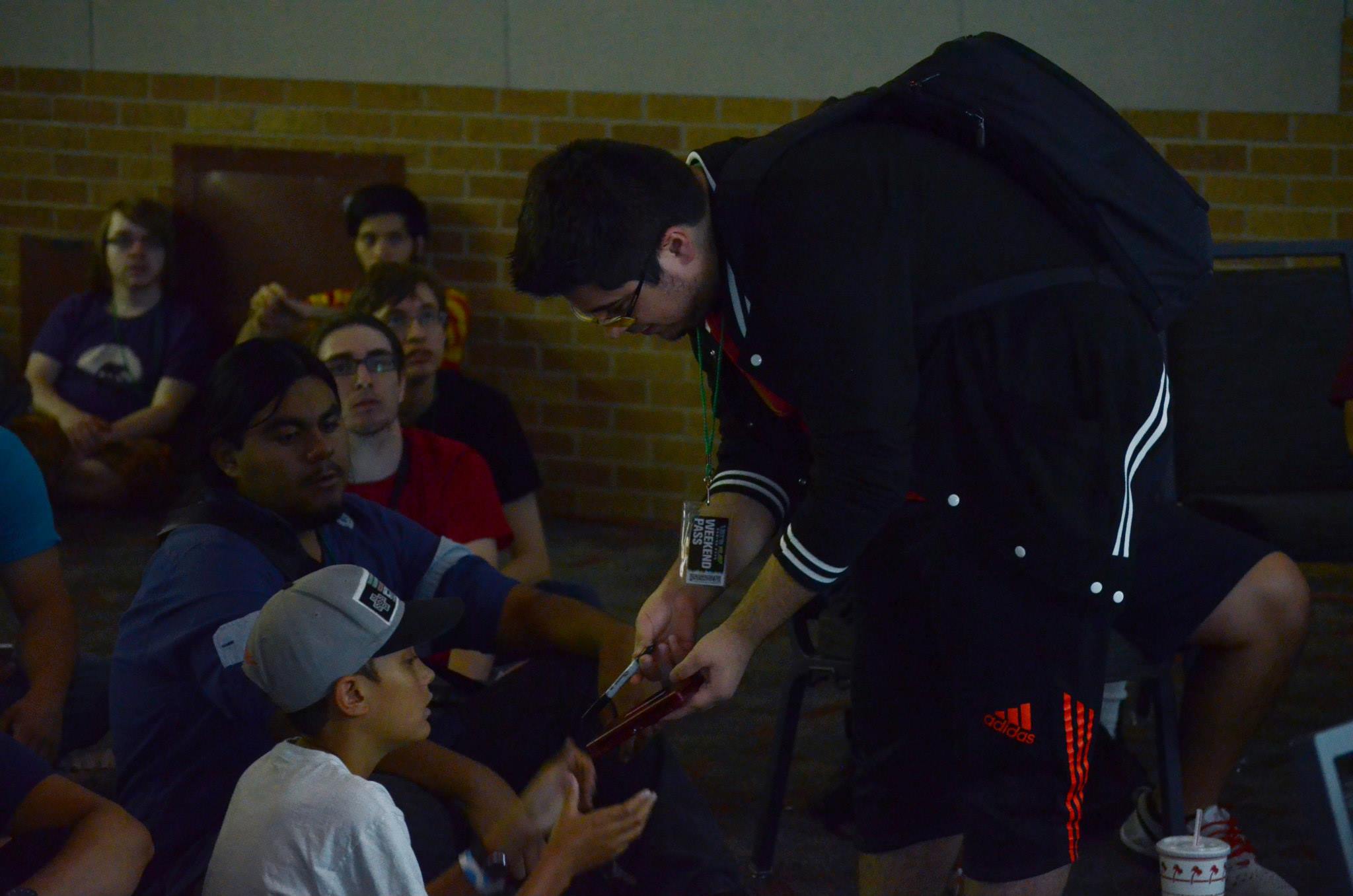 Low Tier City 3; ZeRo stops for a moment to sign for a fan