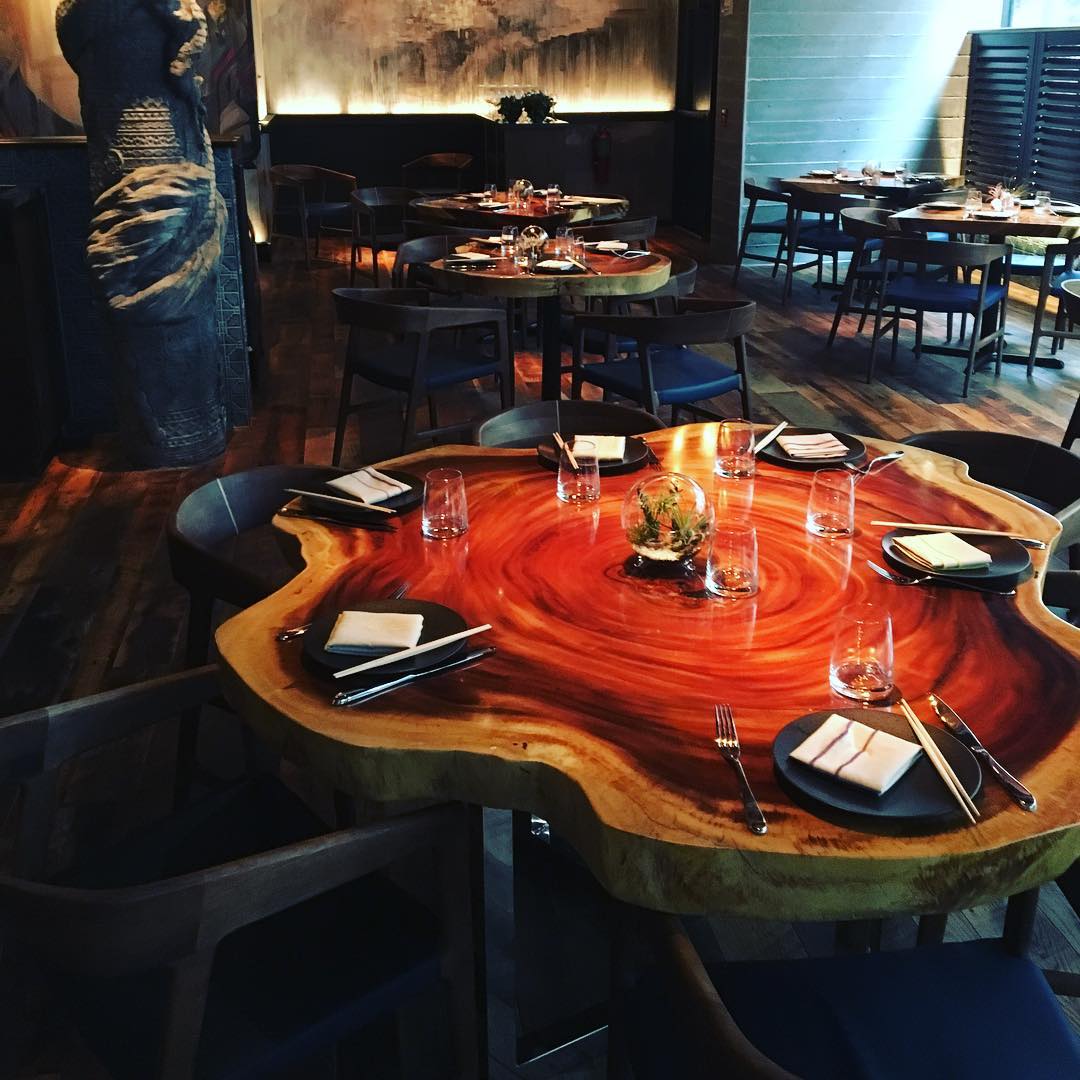  60" round cross-cut golden acacia - One of 30 custom built tables for Ruka in Boston 