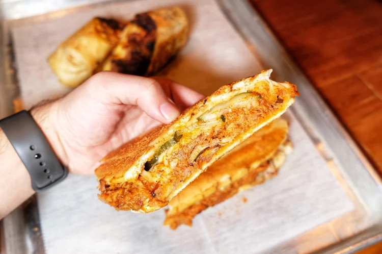 The Cuban sandwich at Cash Only BBQ was a popular (and delicious) item there.