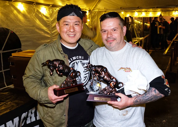 Rob Cho of Kimchi Smoke (left) won People's Choice and second place overall, while Richie Holmes of Juicy Lucy BBQ (right) took home the crown at Brisket King NYC 2019.