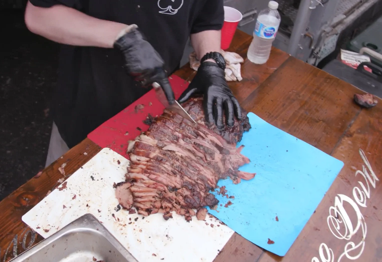 The awesome Handsome Devil crew prepares barbecue at Sun BBQ Fest 2018.