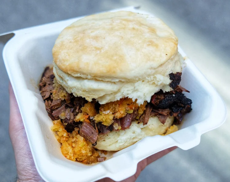 The signature brisket-on-a-biscuit sandwich from Biscuit N Brisket.