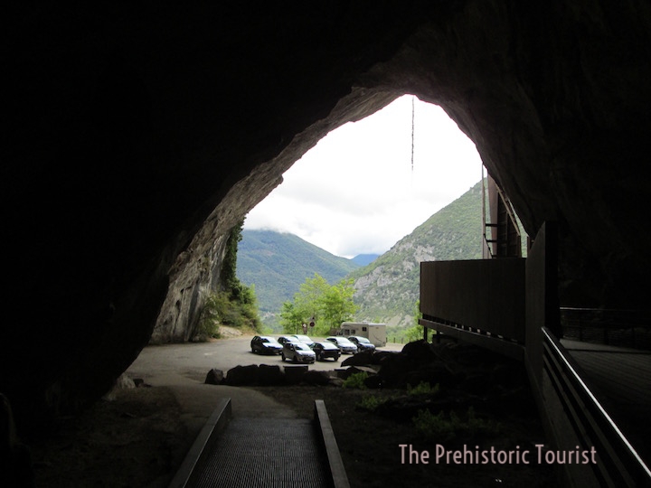 The entrance to Niaux Cave, featuring the paleolithic car park.