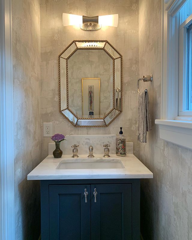 We relocated this powder room to the back of the house to include a window because tiny rooms deserve natural light☀️ #dreamy #powderroom #renovation #irvington #rivertowns #renovations #beforeandafter #bathroom #reno #interiordesign #wallpaper #stone #polishednickel #customvanity #transitional #design #interiordesign #interiors #westchester #home