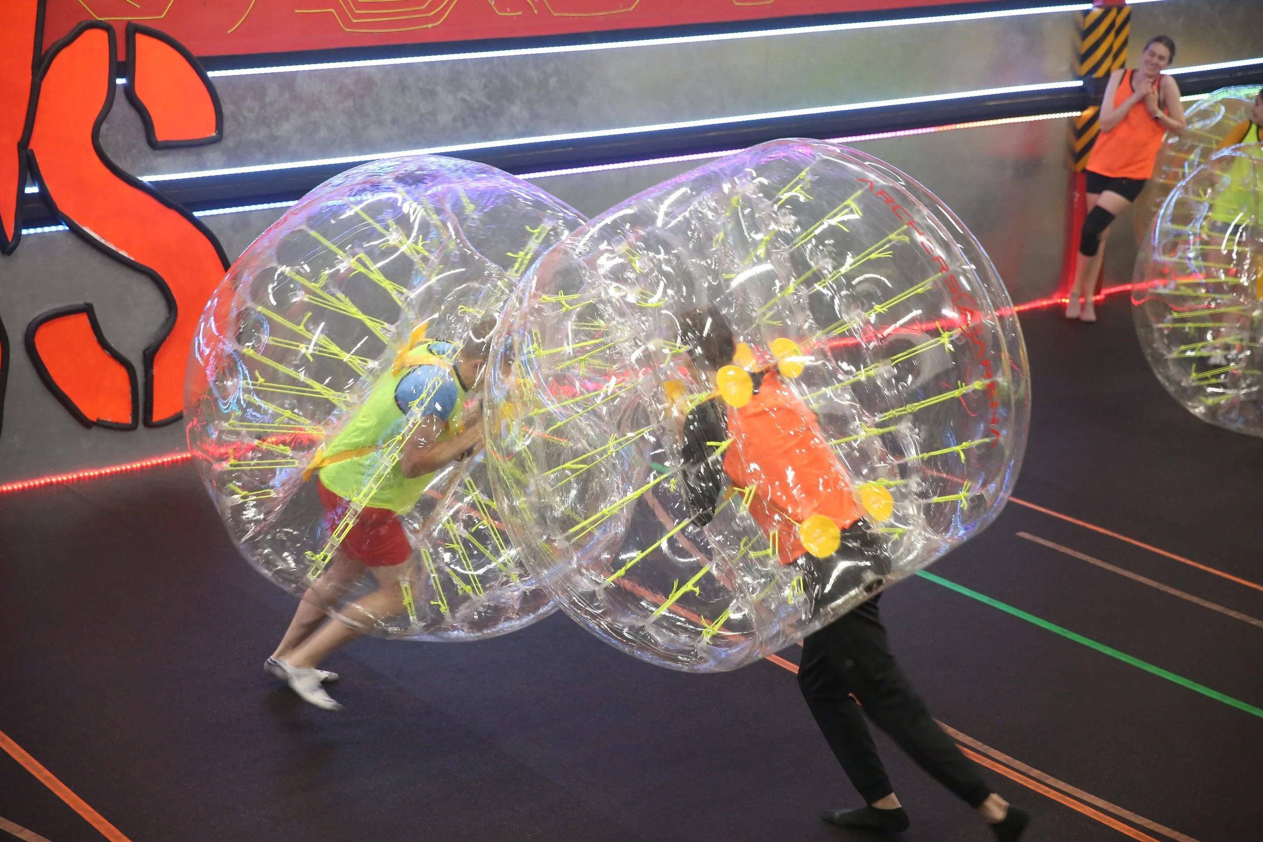 Kids laughing inside giant bubbles during Bubble Soccer on a PA day in North York