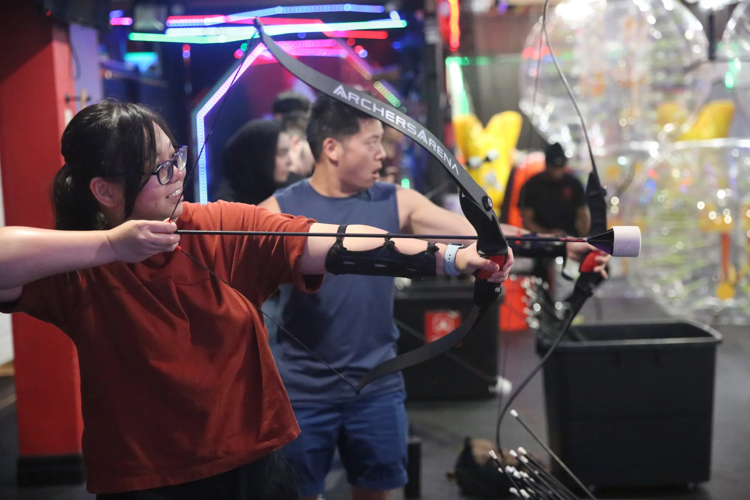 Arrow hitting the bullseye during a stress relief archery session in Toronto