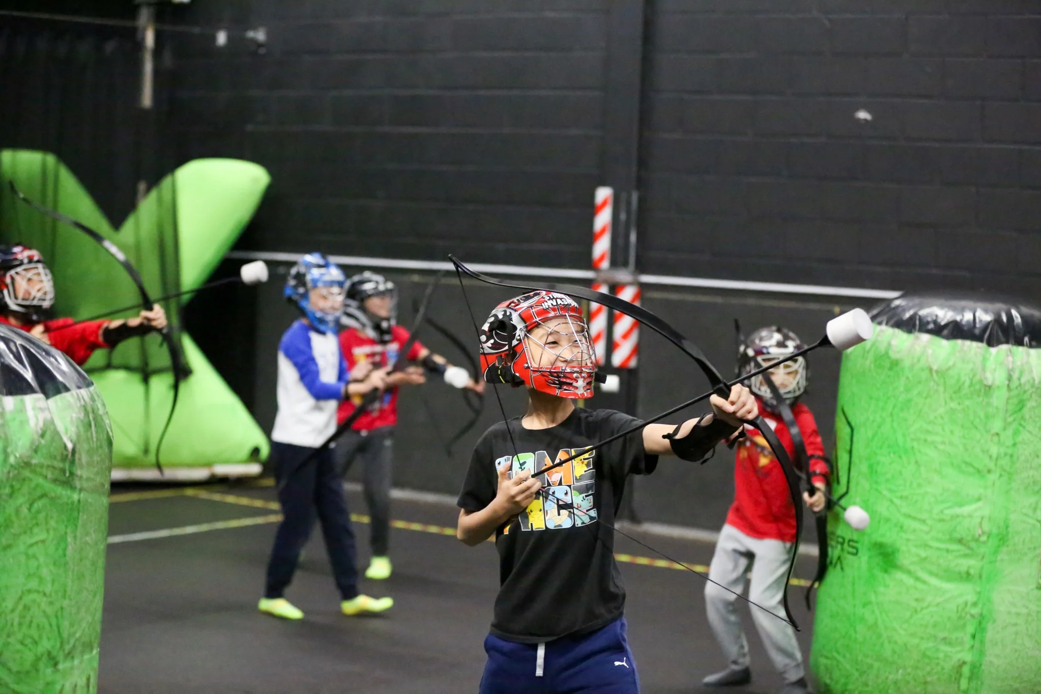 Kids playing Combat Archery at Archers Arena in North York