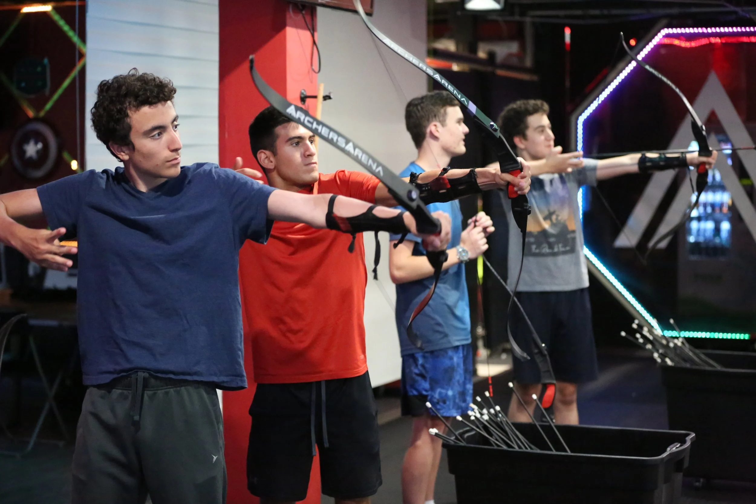 Adult learning beginner archery training at Archers Arena Toronto