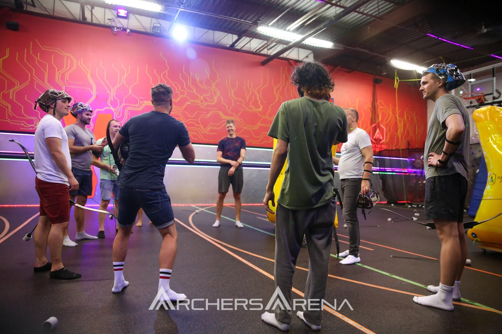 Corporate team celebrating during a last-minute corporate event in Toronto at Archers Arena