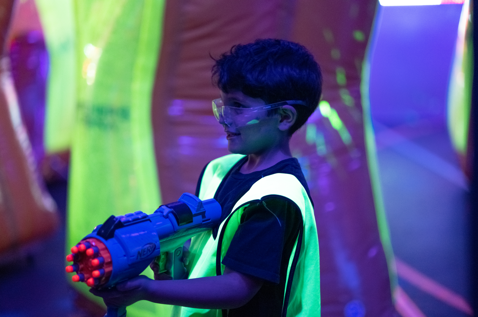Kids taking cover during a Nerf Blaster Wars game on a PA day in Toronto