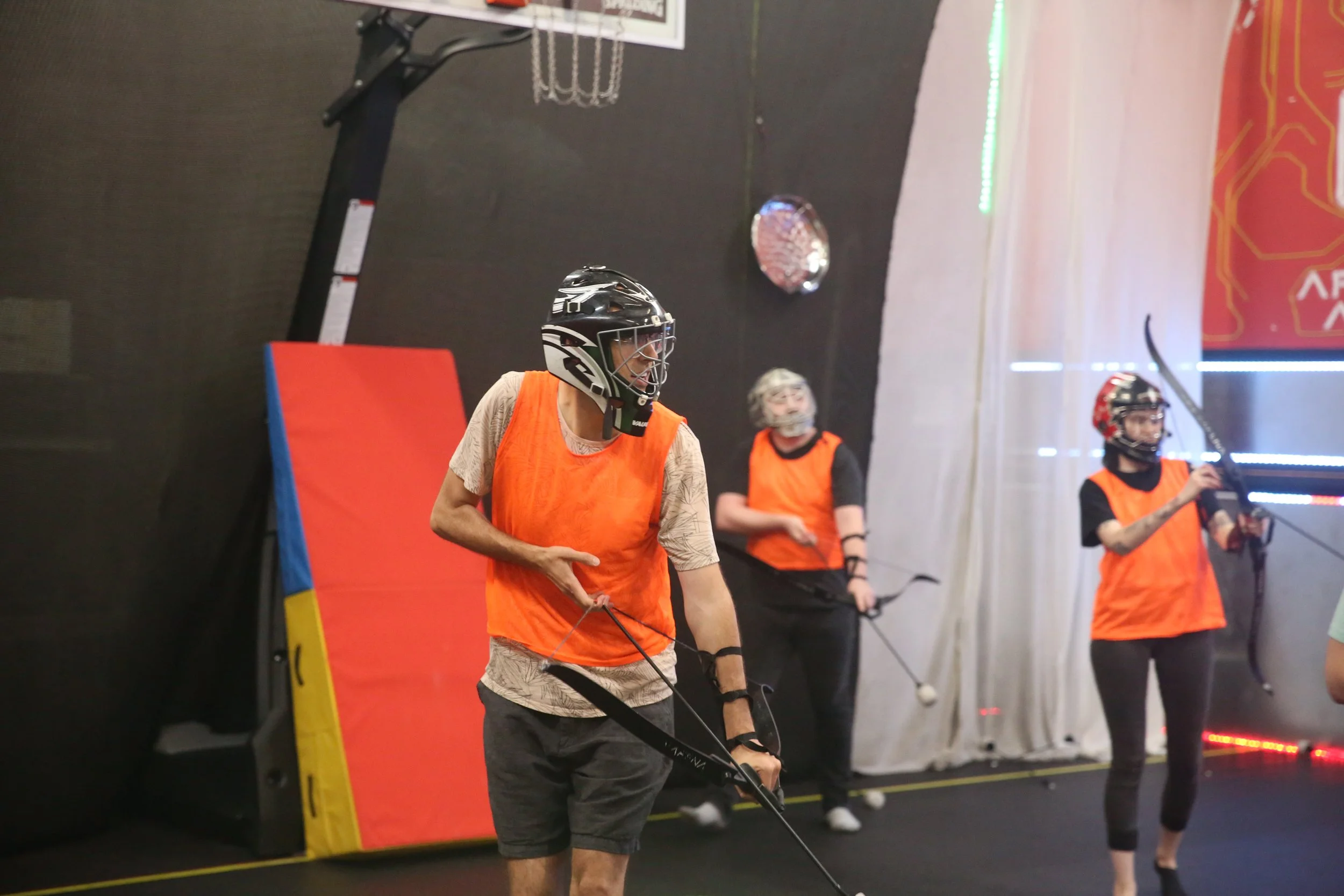 Corporate team celebrating together during an event at Archers Arena Toronto