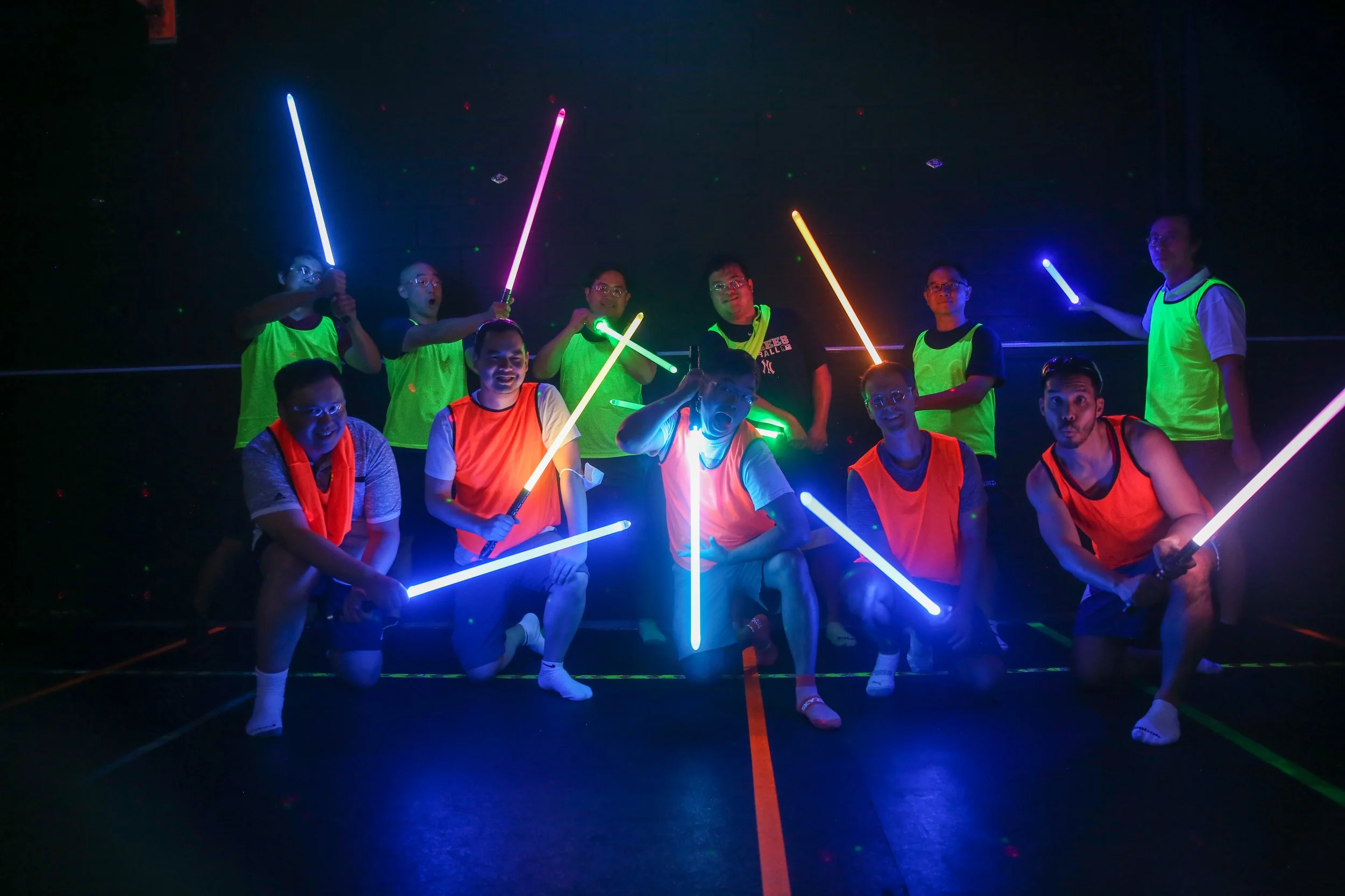 Large corporate group participating in team-building activities at Archers Arena Toronto