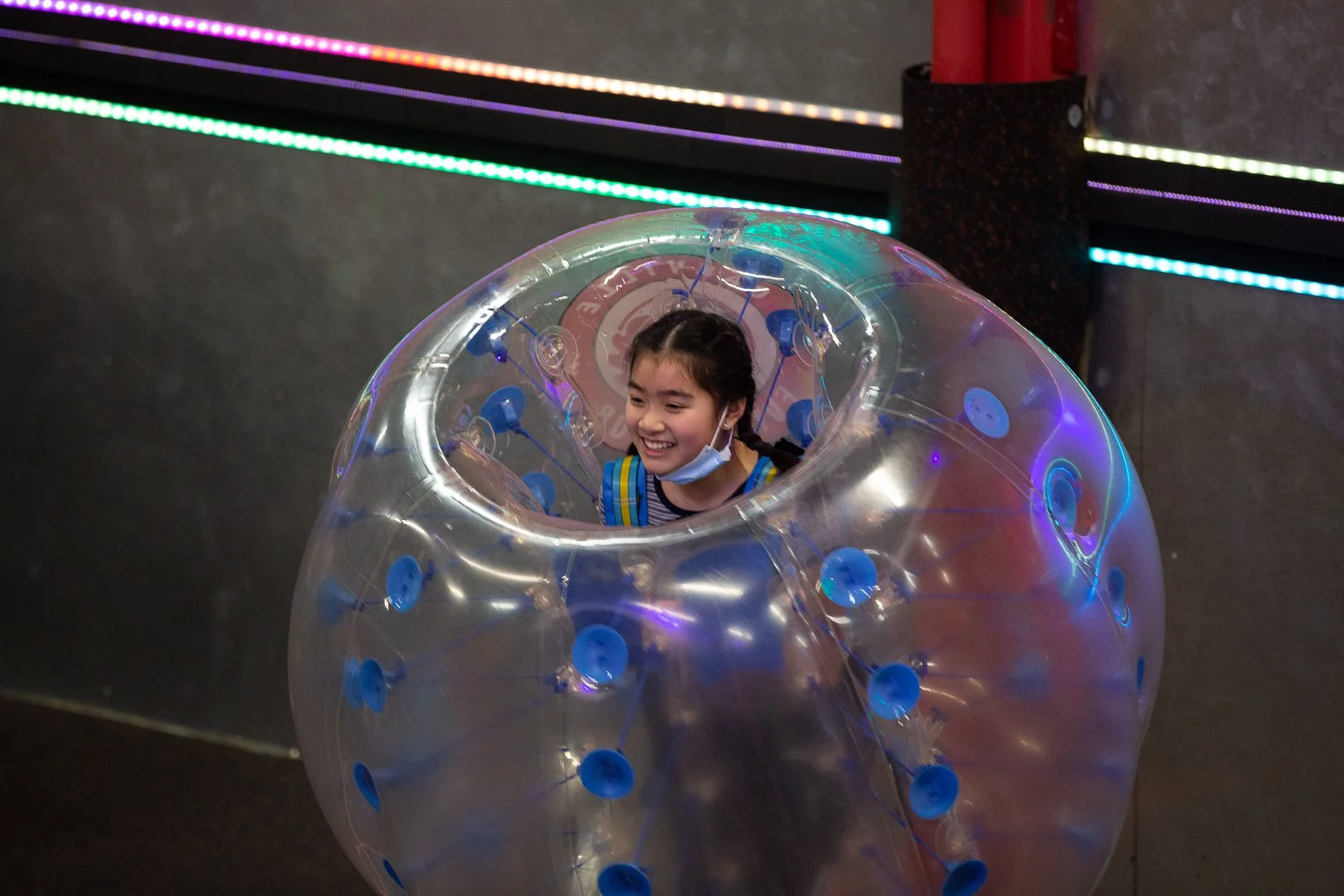 Teenagers laughing and playing Bubble Soccer at Archers Arena