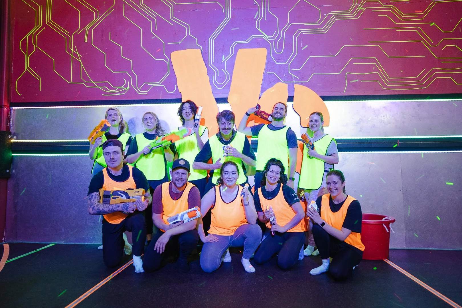 Group participating in Nerf blaster team-building activity in Toronto